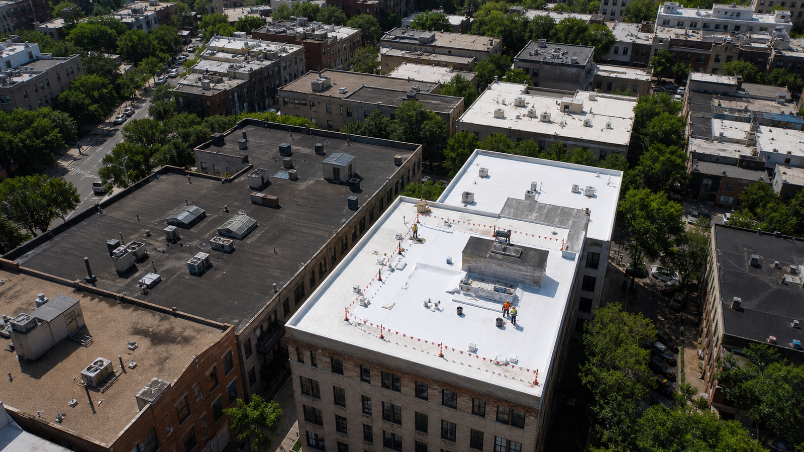 Aerial city blocks show individual cool-roof candidates highlighted by high-resolution heat and reflectivity mapping.